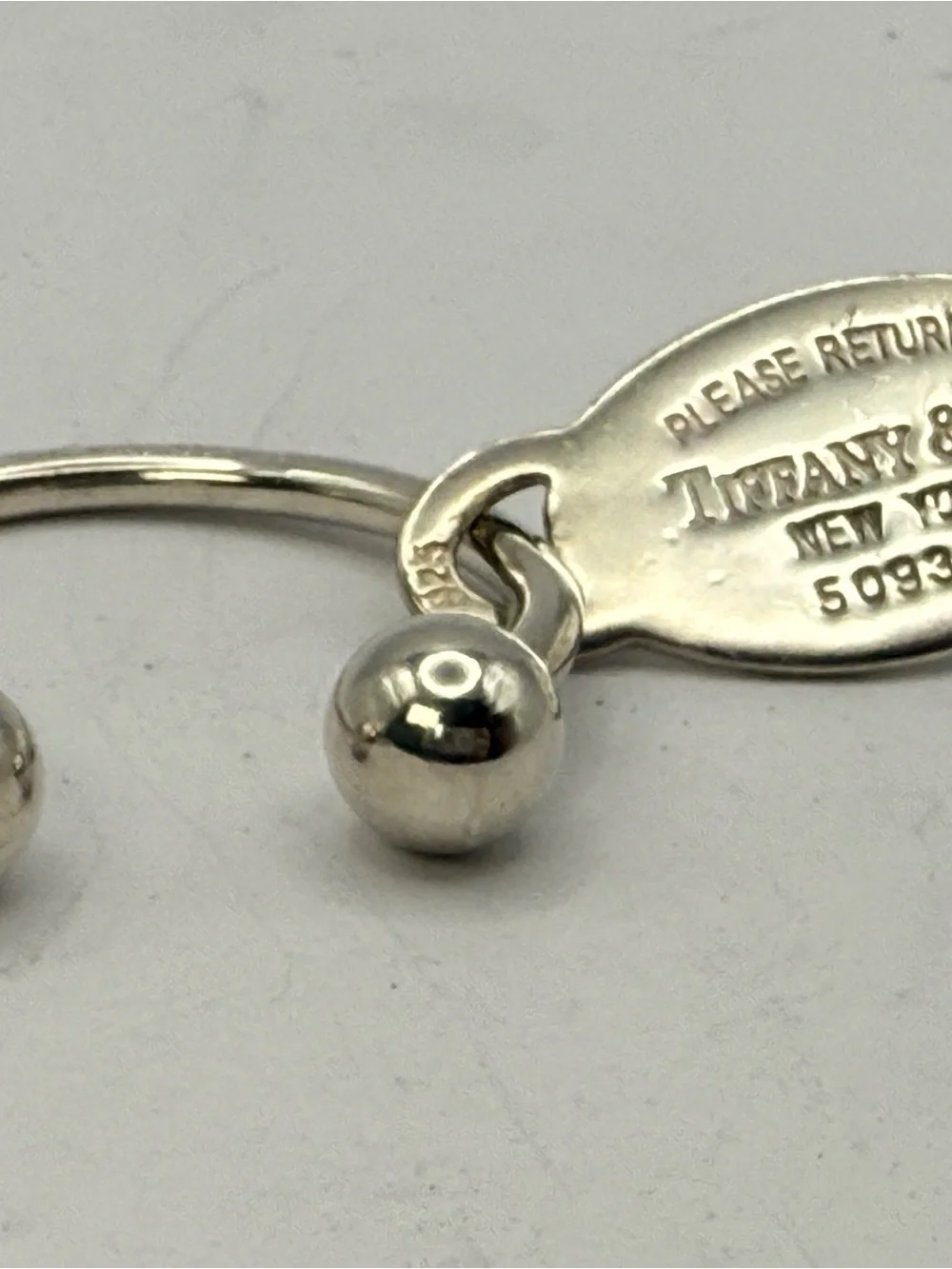 Tiffany & Co. Sterling Silver 'Please Return' Oval Tag Key Ring - Silver Large